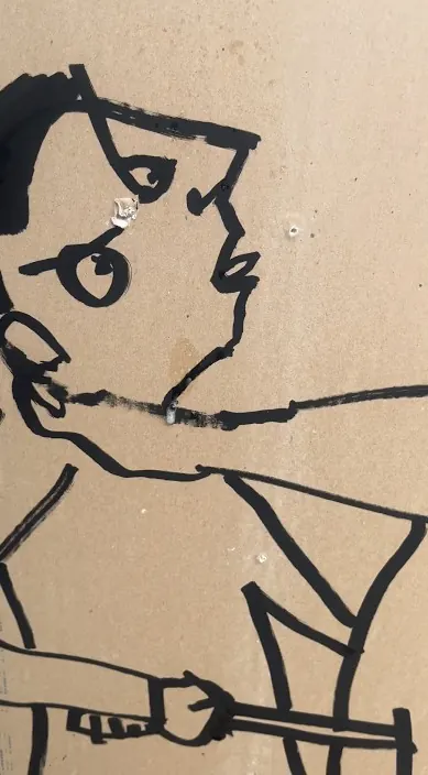 Black line drawing of a figure on a piece of cardboard, «Fútbol», Barcelona, Art Is Trash