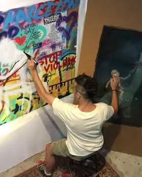 Pintando a dos manos – street art in Barcelona: scene from the Art Is Trash video by Francisco de Pájaro